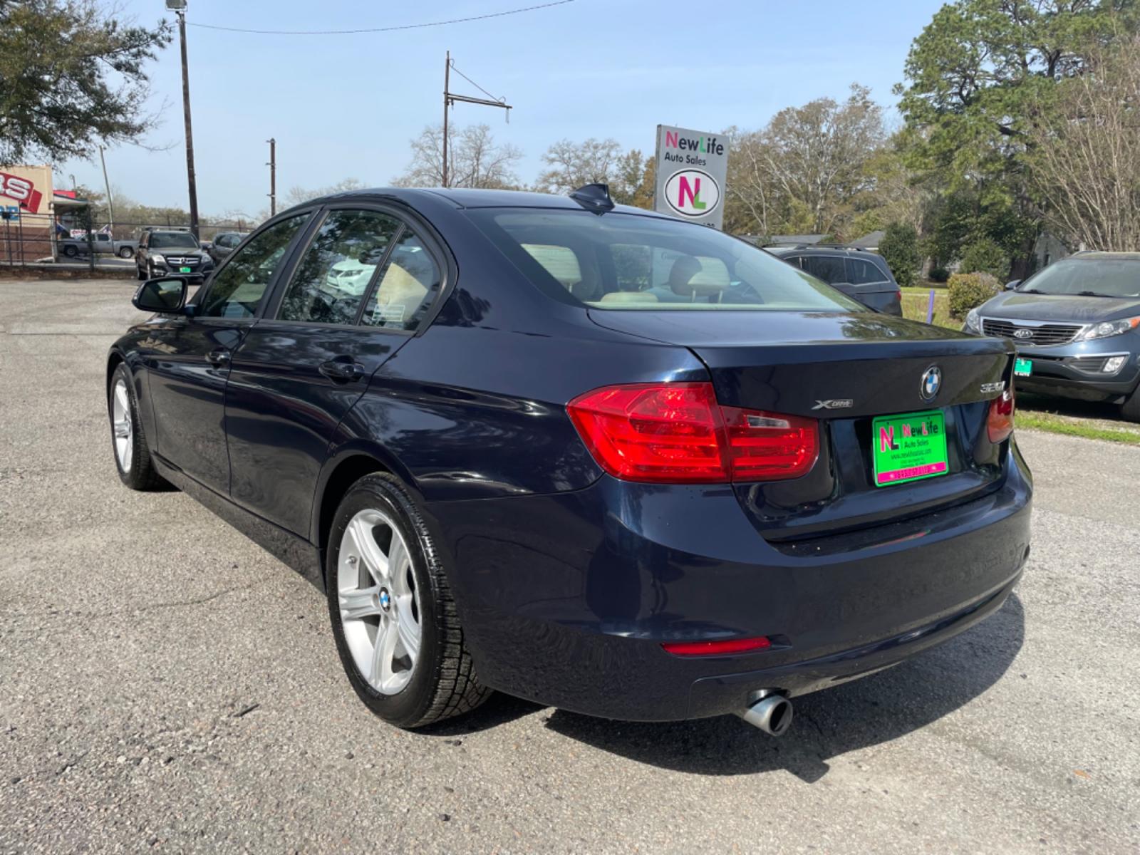 2014 BLUE BMW 3 SERIES 320I XDRIVE (WBA3C3G54EN) with an 2.0L engine, Automatic transmission, located at 5103 Dorchester Rd., Charleston, SC, 29418-5607, (843) 767-1122, 36.245171, -115.228050 - Local Trade-in with Leather, Sunroof, Navigation, CD/AUX/USB, Hands-free Phone, Dual Climate Control, Power Everything (windows, locks, seats, mirrors), Heated, Seats, Push Button Start, Keyless Entry, Alloy Wheels. Clean CarFax (no accidents reported) 101k miles Located at New Life Auto Sales! 202 - Photo #4